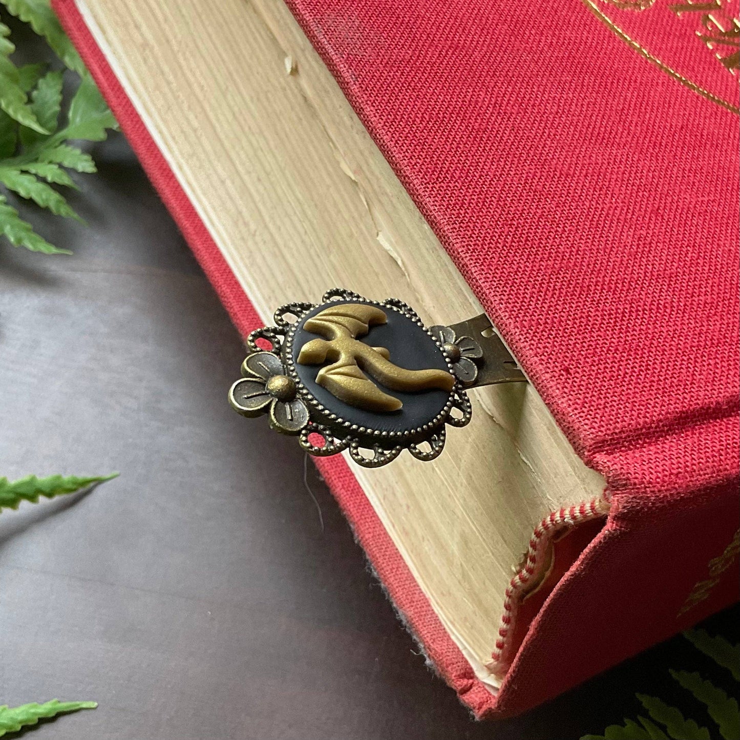 Dragon themed bookmark in a red hardcover book