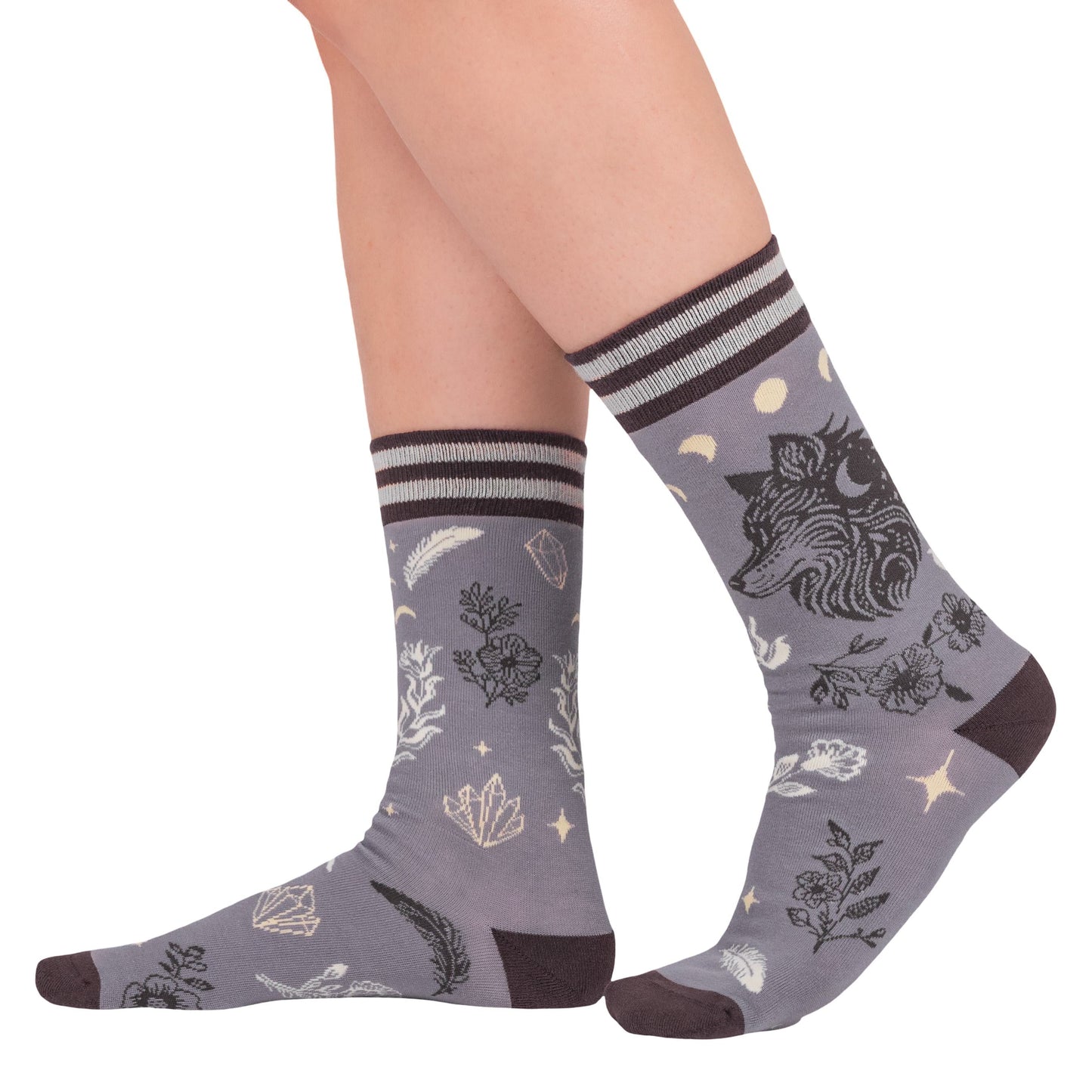 Gray socks with nature-themed design worn by a person on a white background