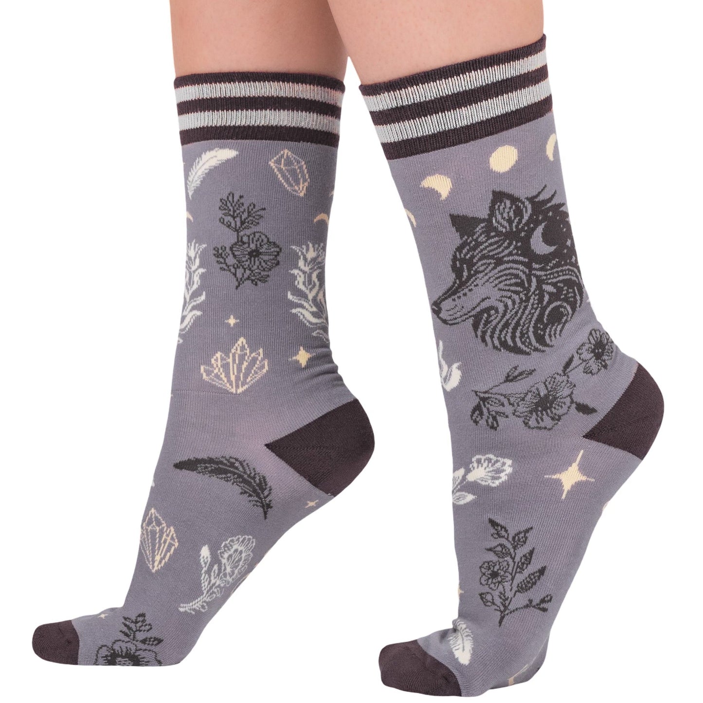 Gray socks with nature-themed designs on a white background