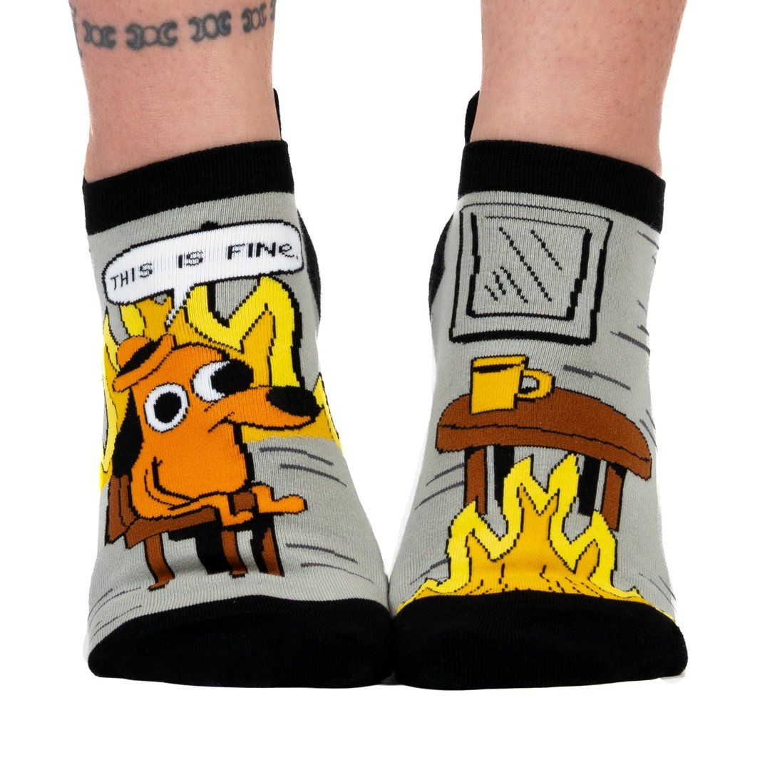 Socks with a dog graphic and 'This is fine' text on a white background