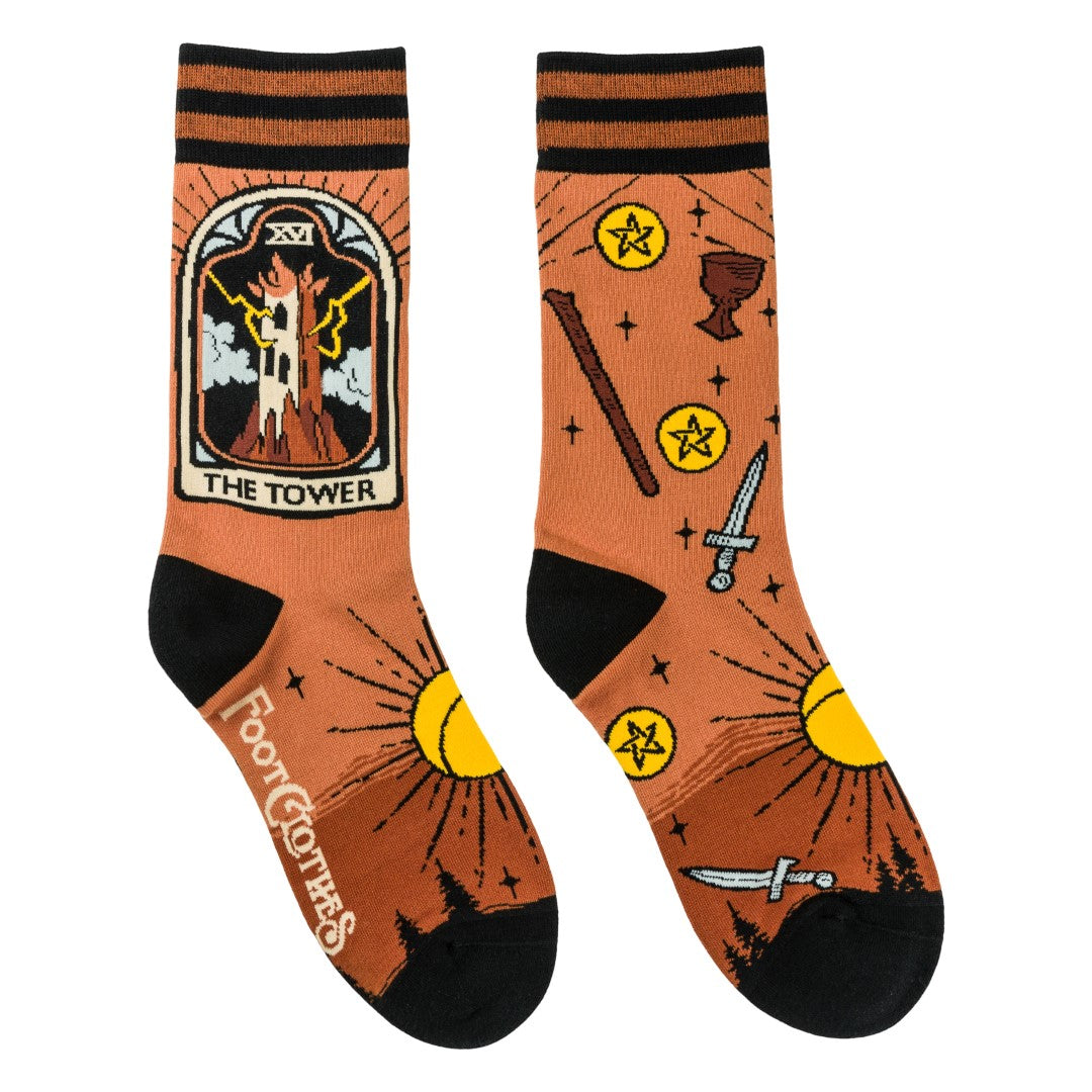 Socks with tarot card design labeled 'The Tower' on a white background