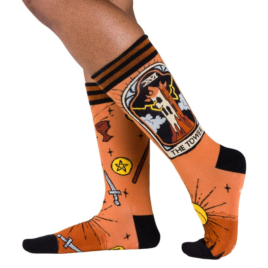 Socks with tarot card design on an orange background