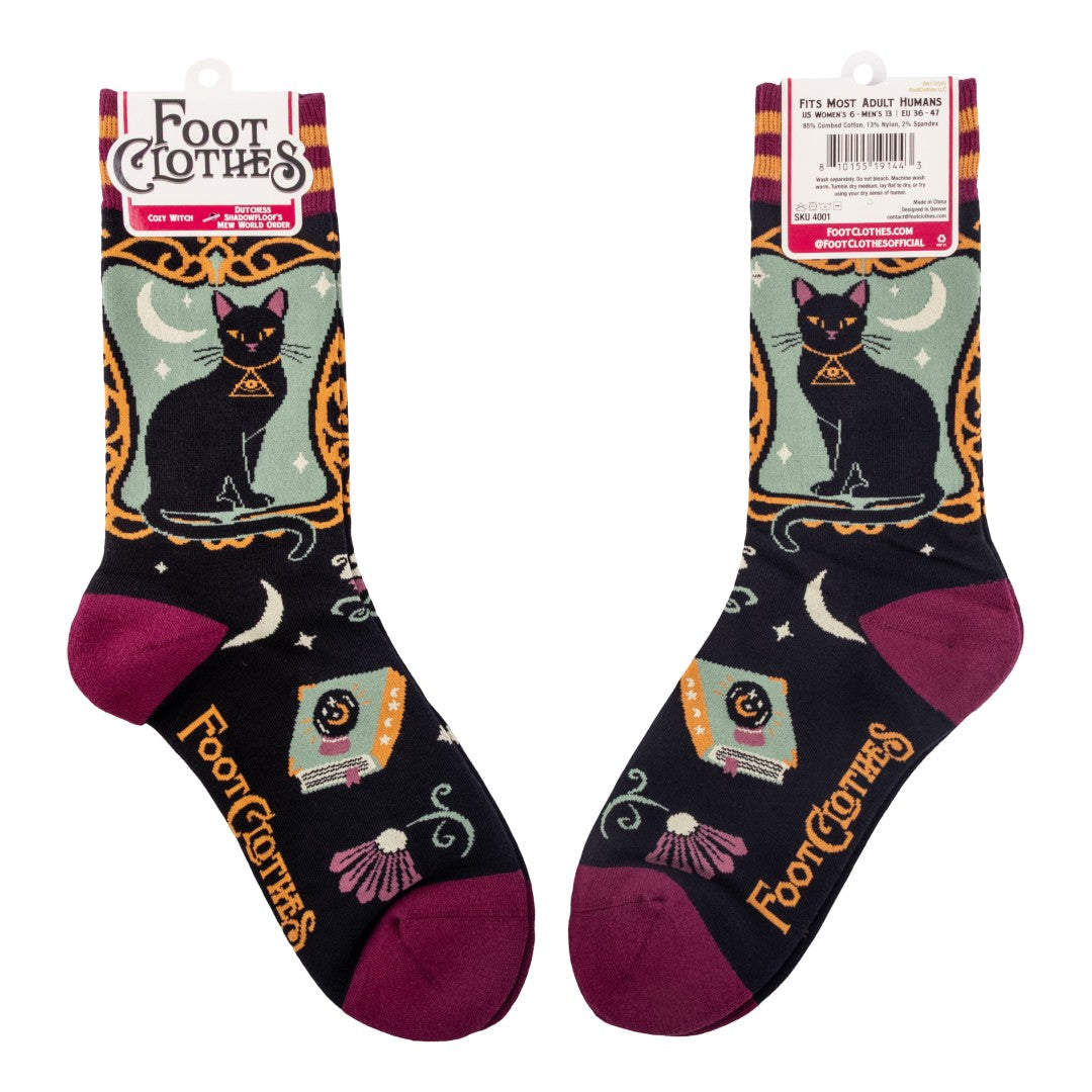 Pair of socks with black cat design and 'Foot Clothes' branding on a white background