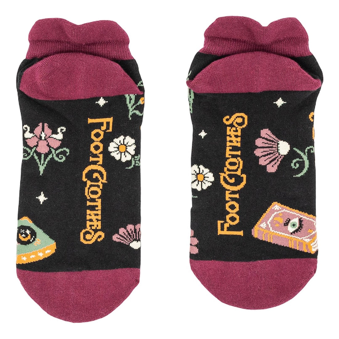 Pair of socks with floral designs and 'Foot Clothes' branding on a white background