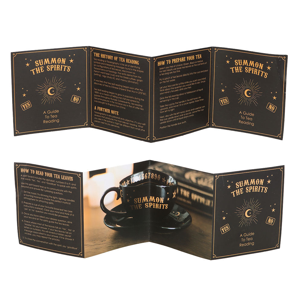 Open book with tea-themed instructions and a black mug on a white background