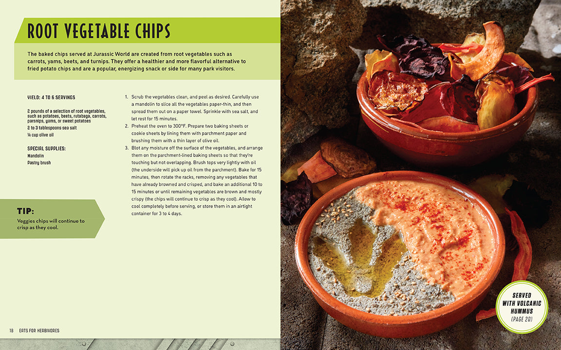 Root vegetable chips served with a dipping sauce on a stone surface.