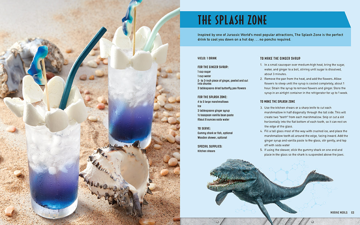 Two blue cocktails with whale-shaped straws on a beach setting, accompanied by a recipe card titled 'The Splash Zone'.