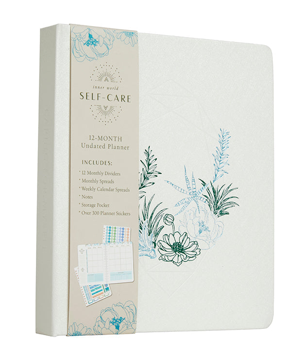 Planner with floral designs on a white background
