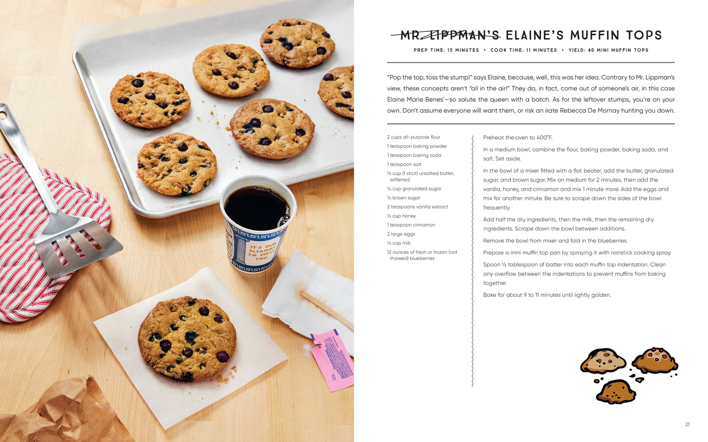 Muffin tops on a baking tray with a cup of coffee and utensils on a wooden surface, alongside a recipe card.