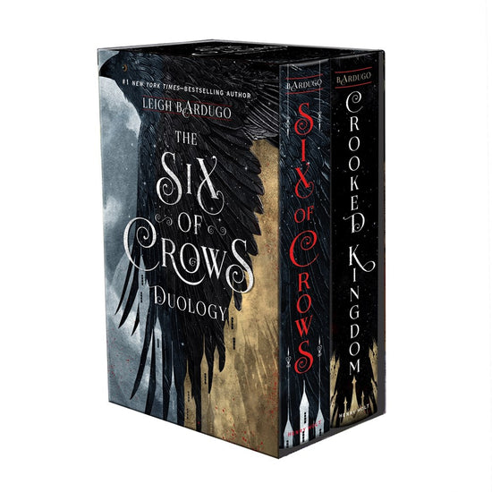 A paperback boxed set of the Six of Crows and Crooked Kingdoms books, with a matching slipcase displaying the series and author name over a large crow illustration.