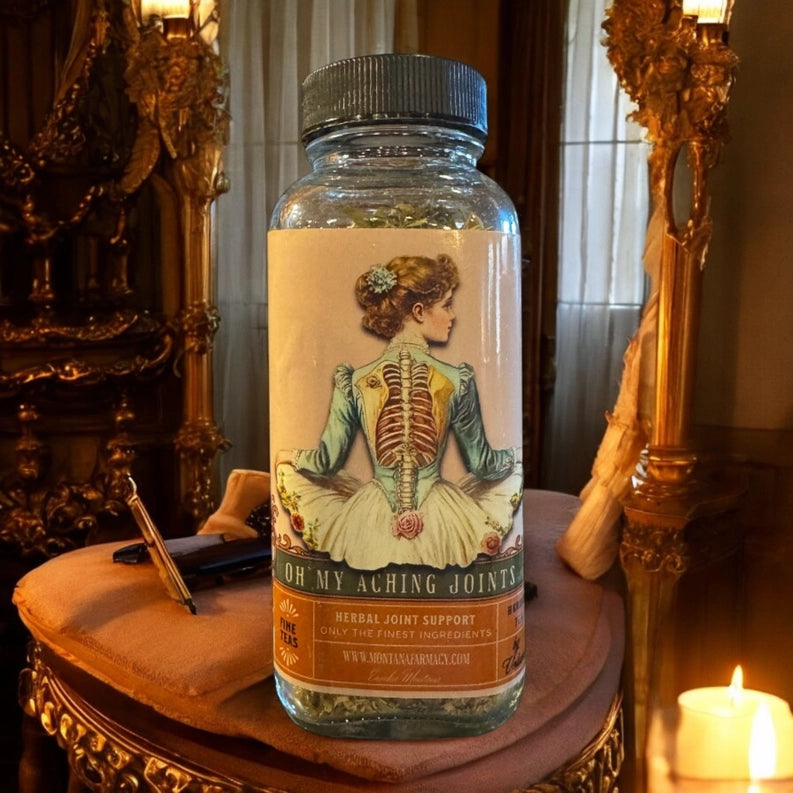 Bottle labeled 'Oh My Aching Joints' on a decorative table with candles and ornate furniture.