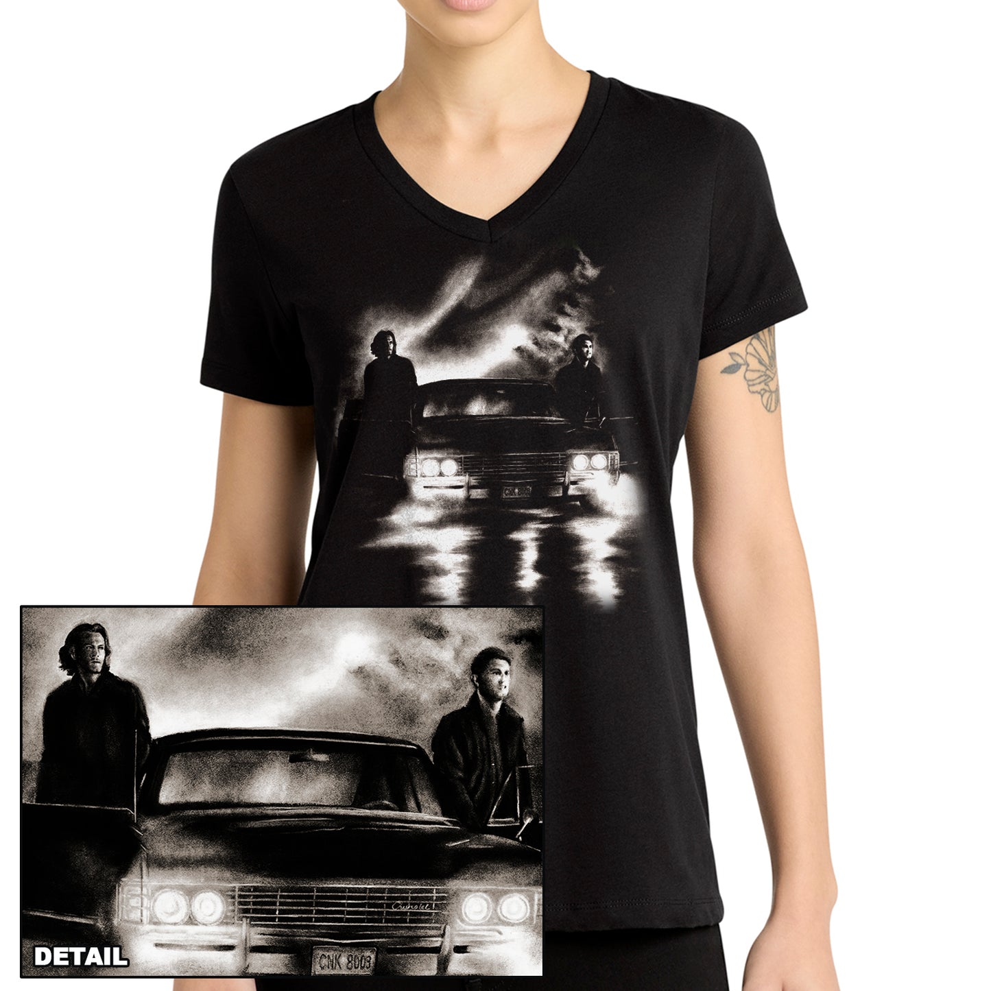 A model in a black v-neck shirt. On the front is a drawing of Sam and Dean Winchester with Baby. Inset is a close up of the drawing.