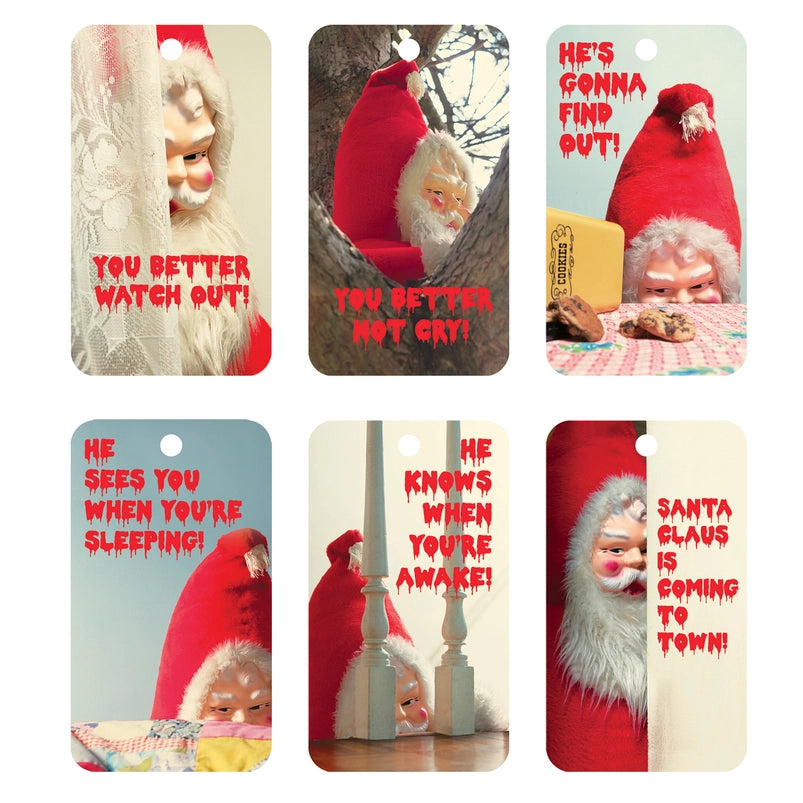Six rectangular gift tags in two rows. Each depicts a creepy image of Santa Claus, with red text at the bottom, stylized to look like it's dripping.