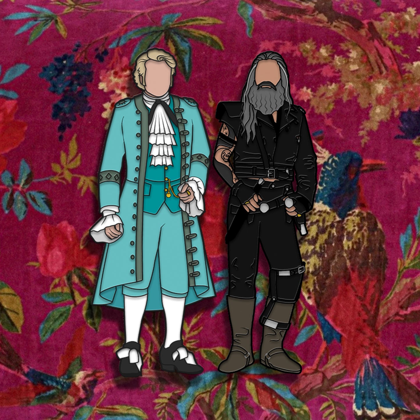 A pair of enamel pins on a red card. The left pin depicts a gentleman in light blue finery from the late 1600s. The right pin depicts a bearded man in dark pirate clothes. The background of the card has a pattern of birds and flowers.