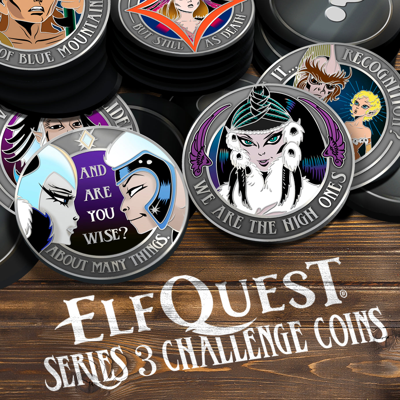 A collection of silver metal  coins on a wooden table. The coins show various scenes and characters from ElfQuest. White writing at the bottom reads: ElfQuest Series 3 Challenge Coins.
