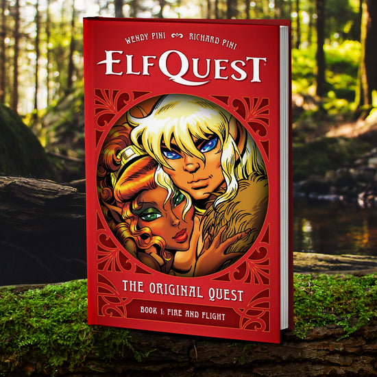 A copy of "ElfQuest: The Original Quest - Book 1: Fire and Flight" by Wendy & Richard Pini. The cover is primarily red and features 2 character illustrations in a circle-framed center. The book is resting against a forest background.