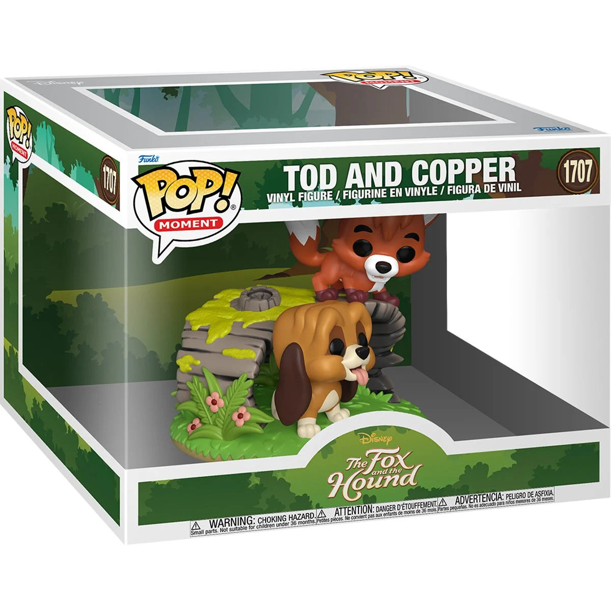 A cardboard box with a transparent front, containing a miniature statue depicting Tod and Copper from The Fox and the Hound. Tod is standing on a hollow tree trunk, and Copper is just below him in the grass.