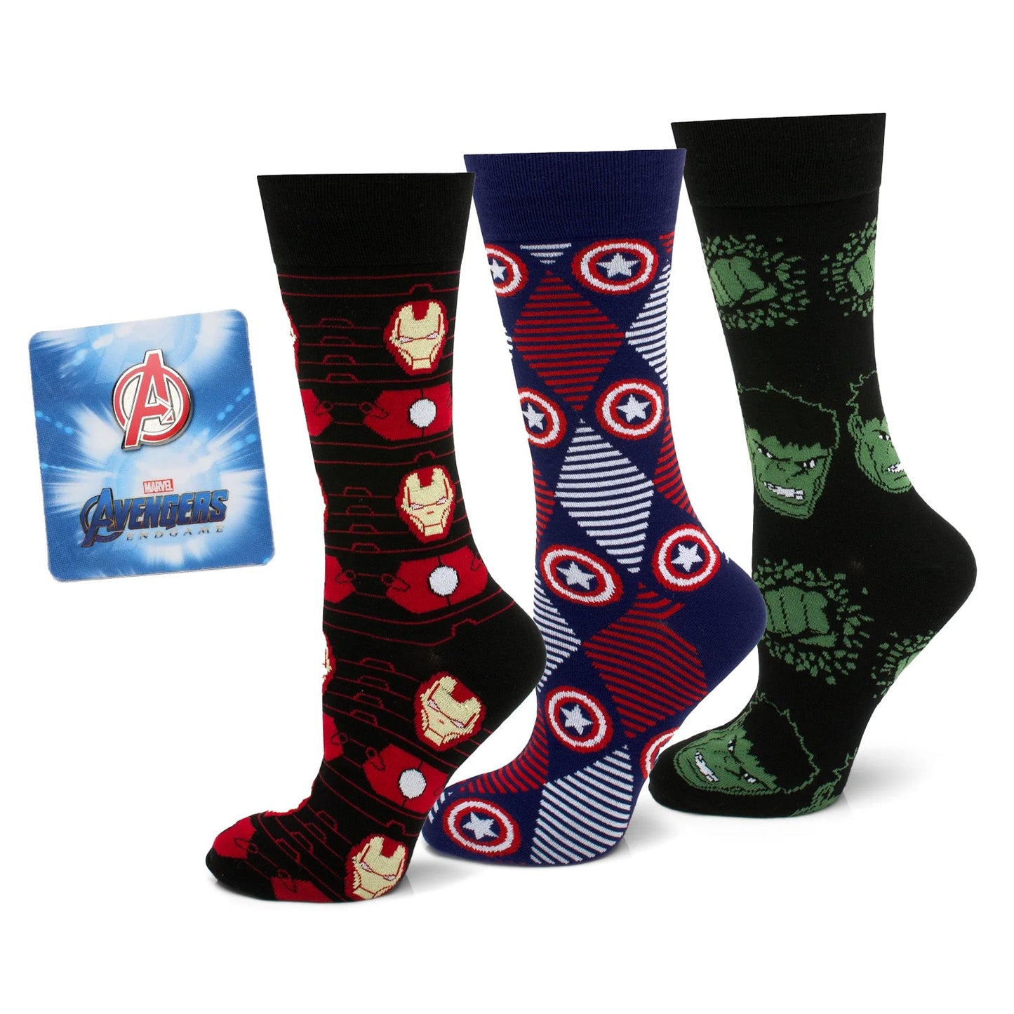Three pairs of socks with superhero designs and an Avengers lapel pin on a white background