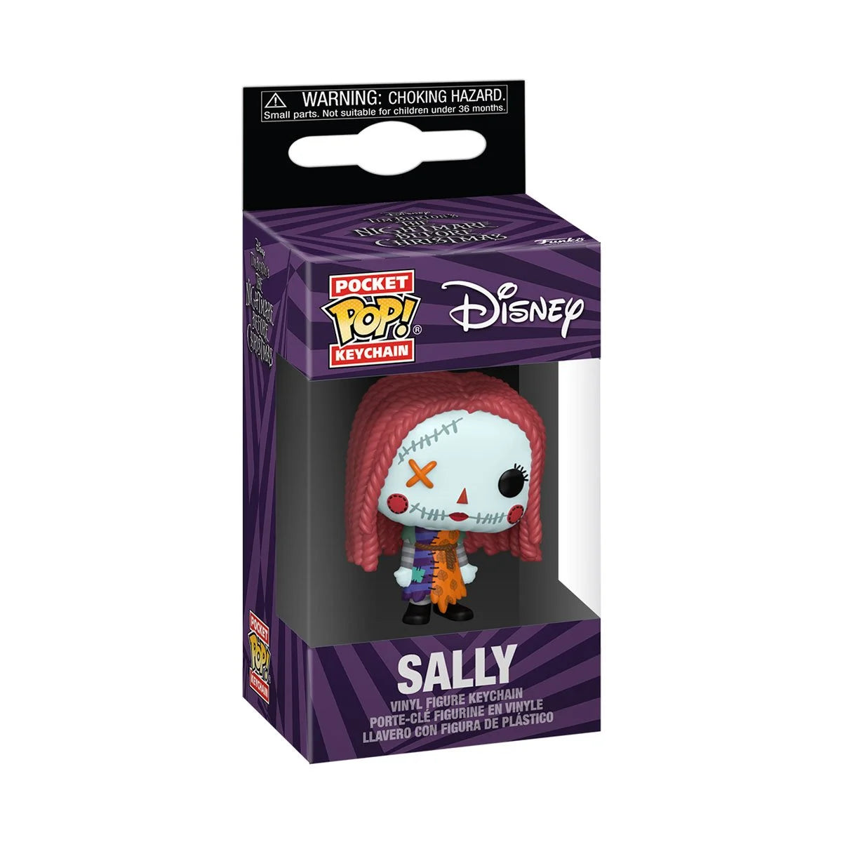A cardboard box with a transparent front, containing a miniature Funko Pop! figure keychain depicting the character Sally from The Nightmare Before Christmas. Sally's clothes are stitched together from mismatched fabrics.