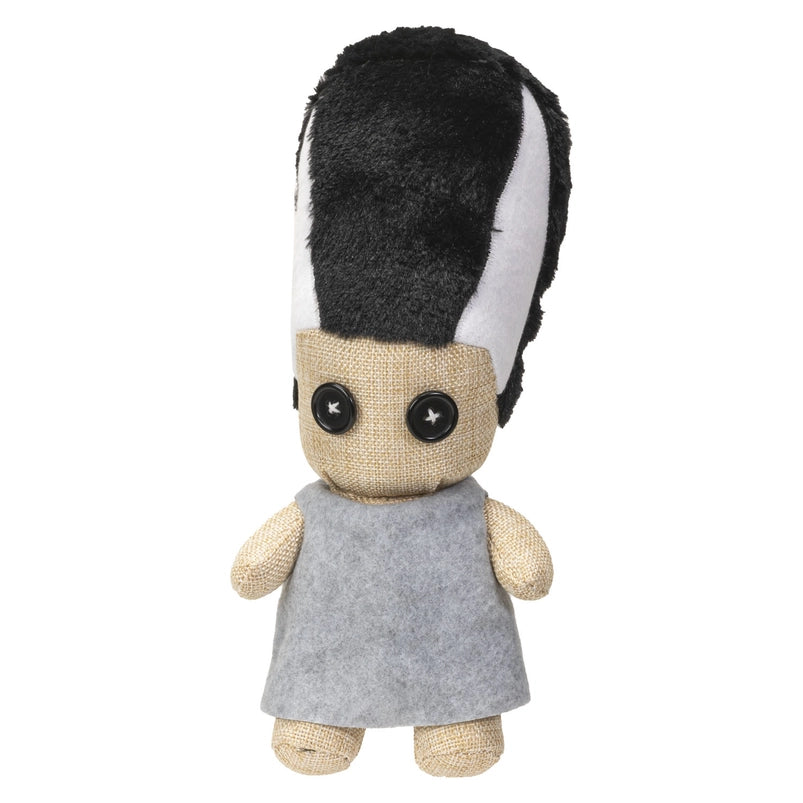 Plush toy with a black and white striped hat and gray dress on a white background