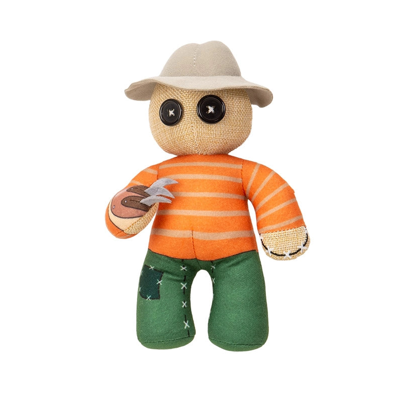 Toy figure wearing an orange striped shirt, green pants, and a beige hat on a white background