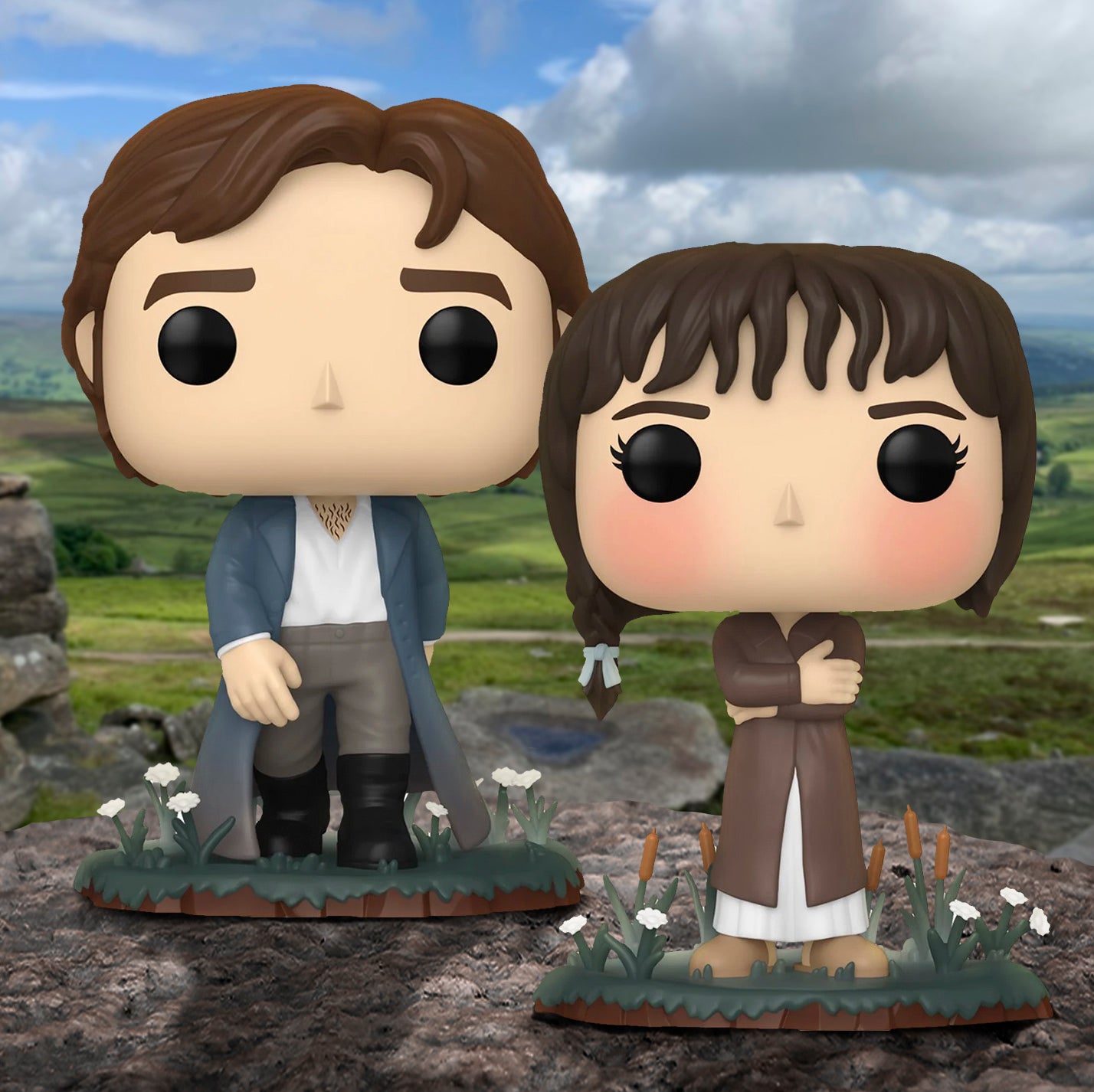 Two figurines of a man and woman standing on rocks with a scenic background