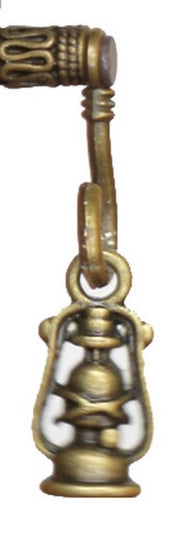 Close-up view of a tiny brass post with a miniature brass lantern hanging from it.