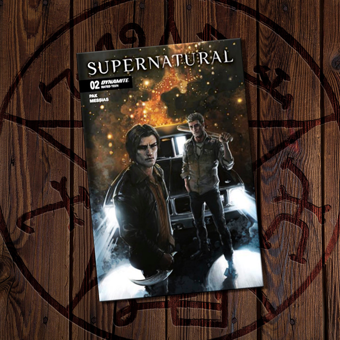 Comic book cover of 'Supernatural' on a wooden background with circular design.