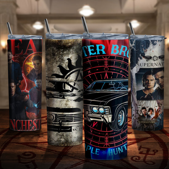 Four tumblers on a wooden table, inside the SPN "bunker." Each tumbler depicts characters and images from the TV series Supernatural.