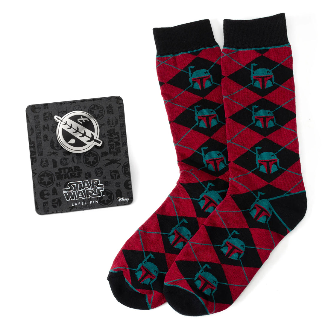 Red and black patterned socks with Mandalorian pattern, next to a Star Wars caped pin on a white background