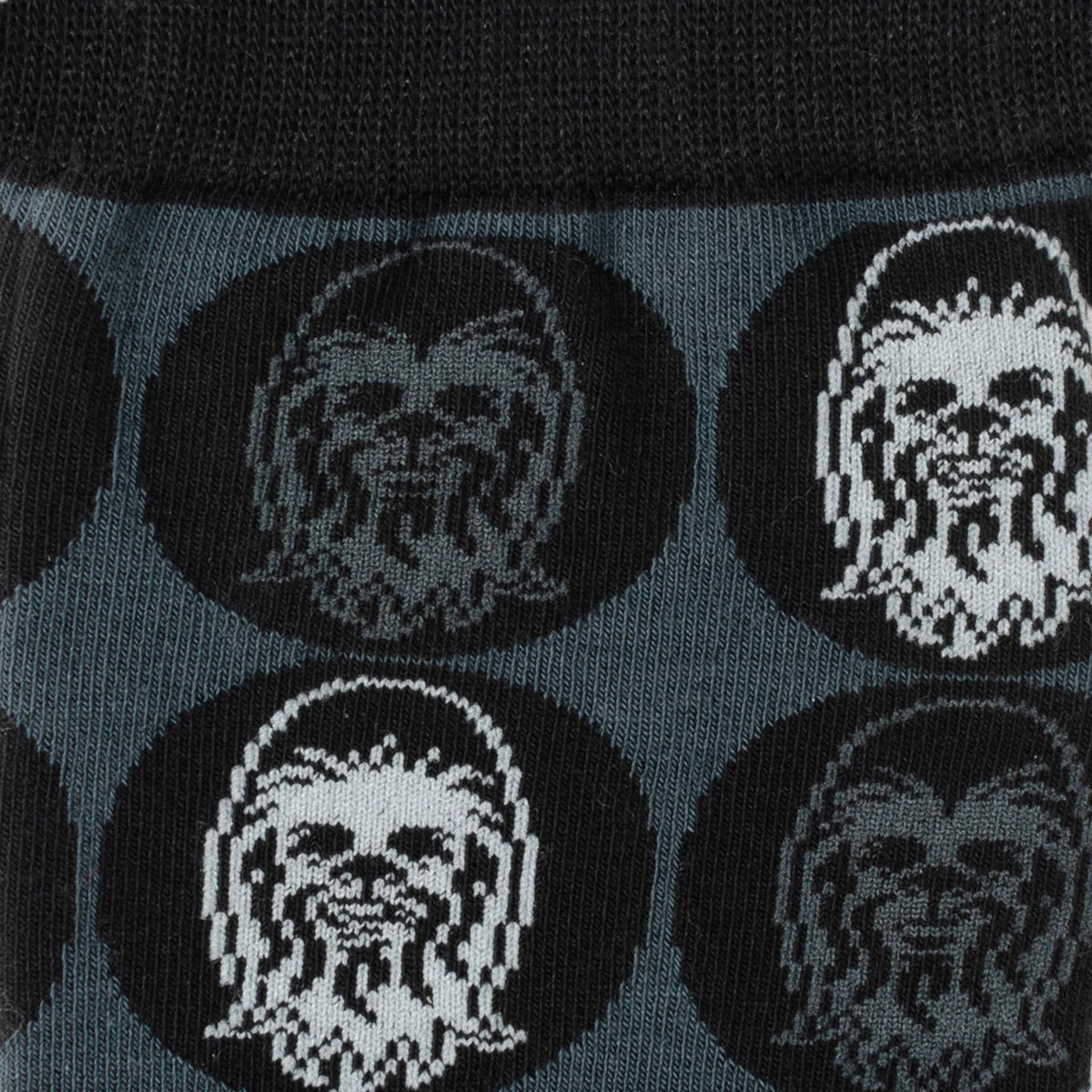 Black and grey socks with white Chewbacca pattern