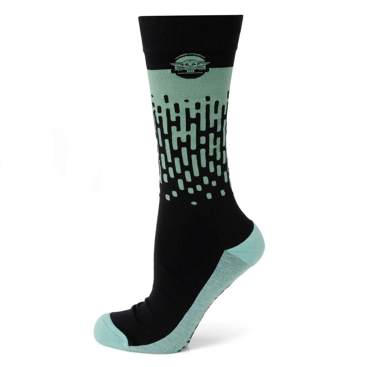 Black and light green sock with geometric pattern on a white background