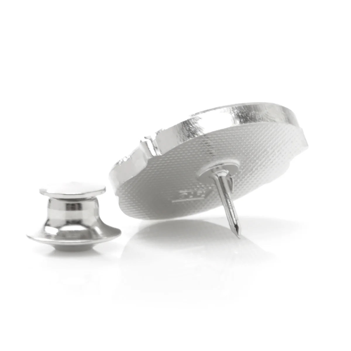 Lapel pin depicting Grogu on a white background