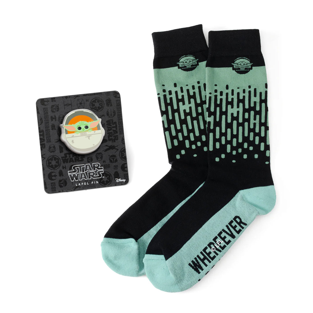 Pair of socks with a design and a pin on a white background