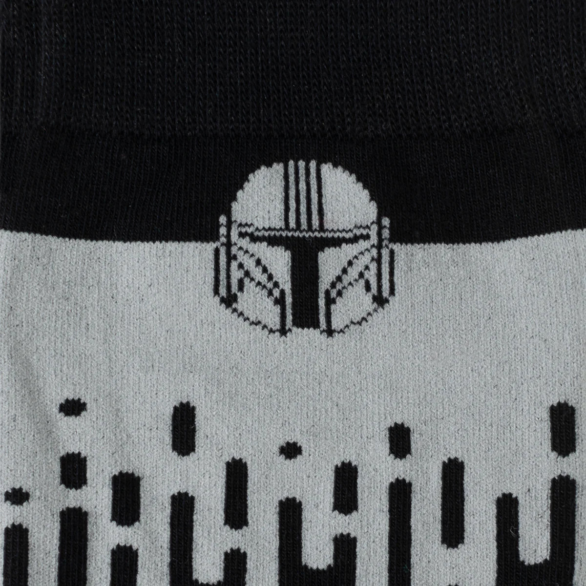Black and gray sock with a Star Wars design on a white background