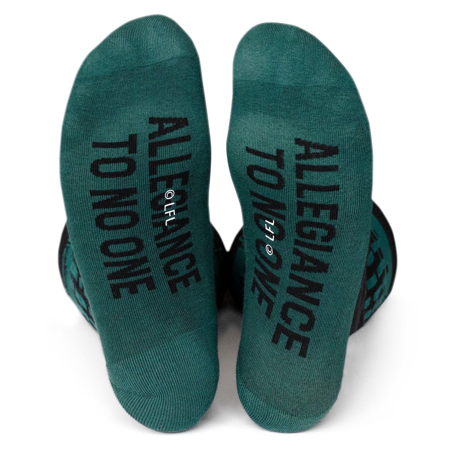 Green socks with 'Allegiance to No One' text on a white background