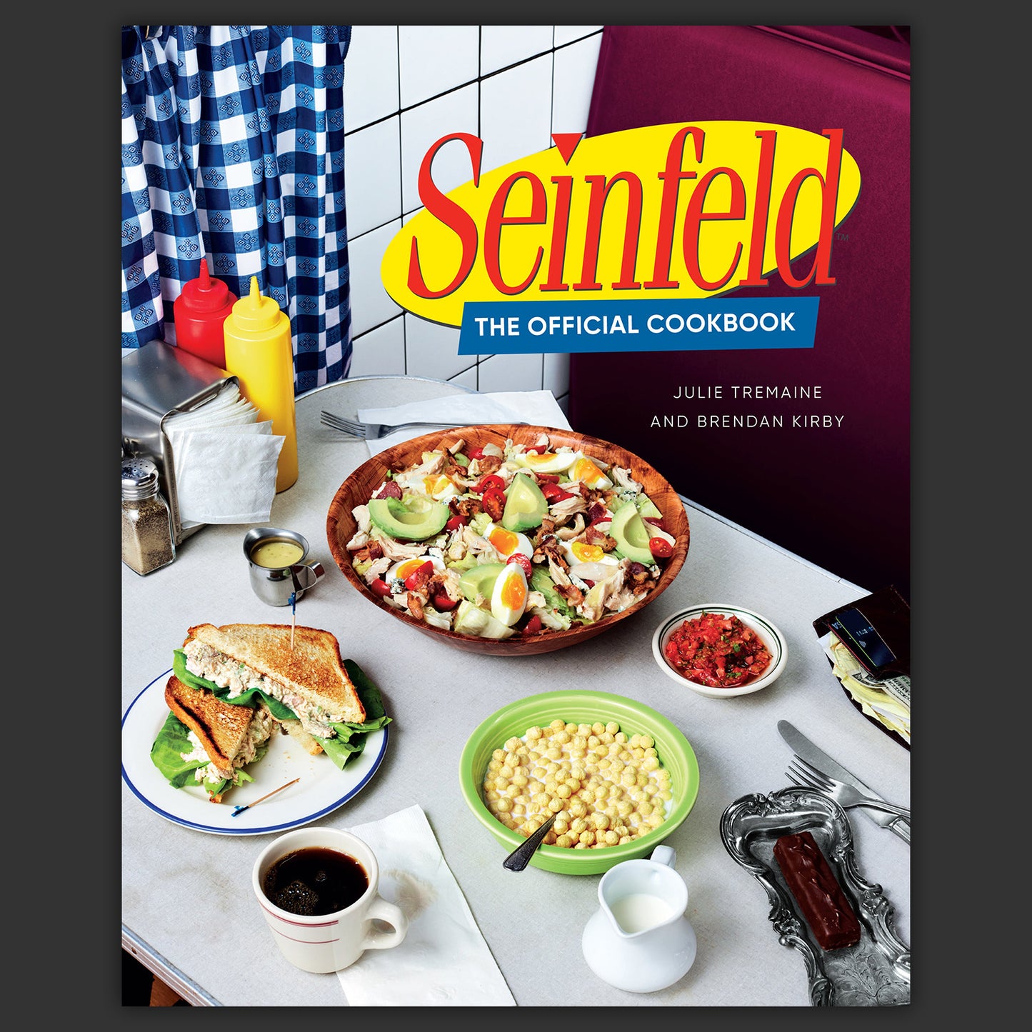Book cover of 'Seinfeld: The Official Cookbook' with food and kitchen setting.