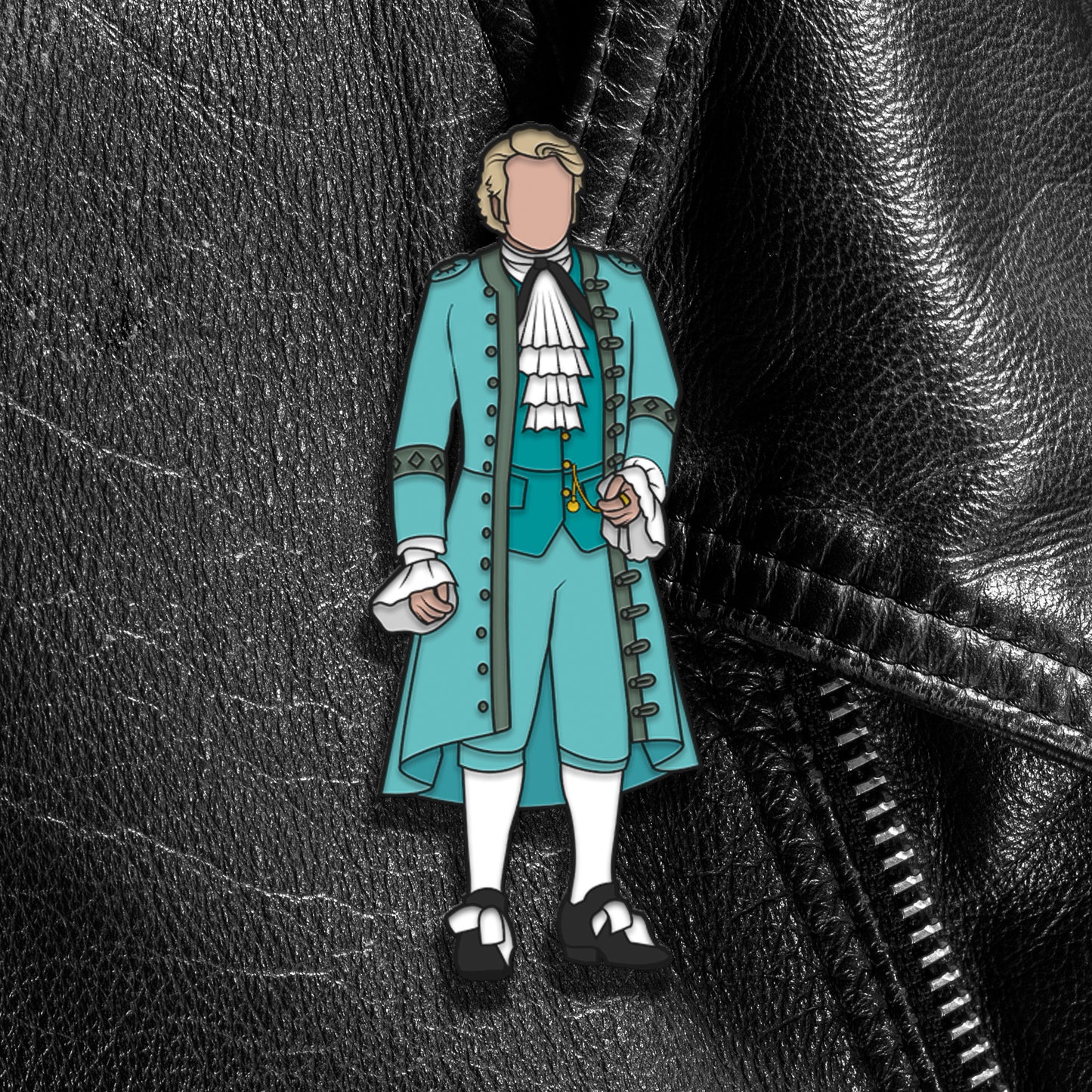 A pin depicting a gentleman in light blue finery, against a black leather jacket.