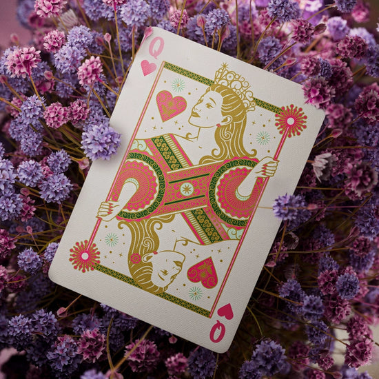 A Queen of Hearts playing card. The image of the queen has been replaced by Glinda from Wicked.