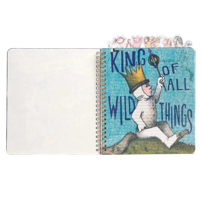 A page from the book showing Max on a blue background, carrying a scepter. Blue text says "king of all the wild things." At the top of the journal are tabs depicting characters from the book.