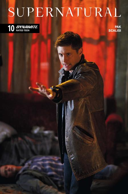Comic book cover of 'Supernatural' with a character holding a gun in a dimly lit room.